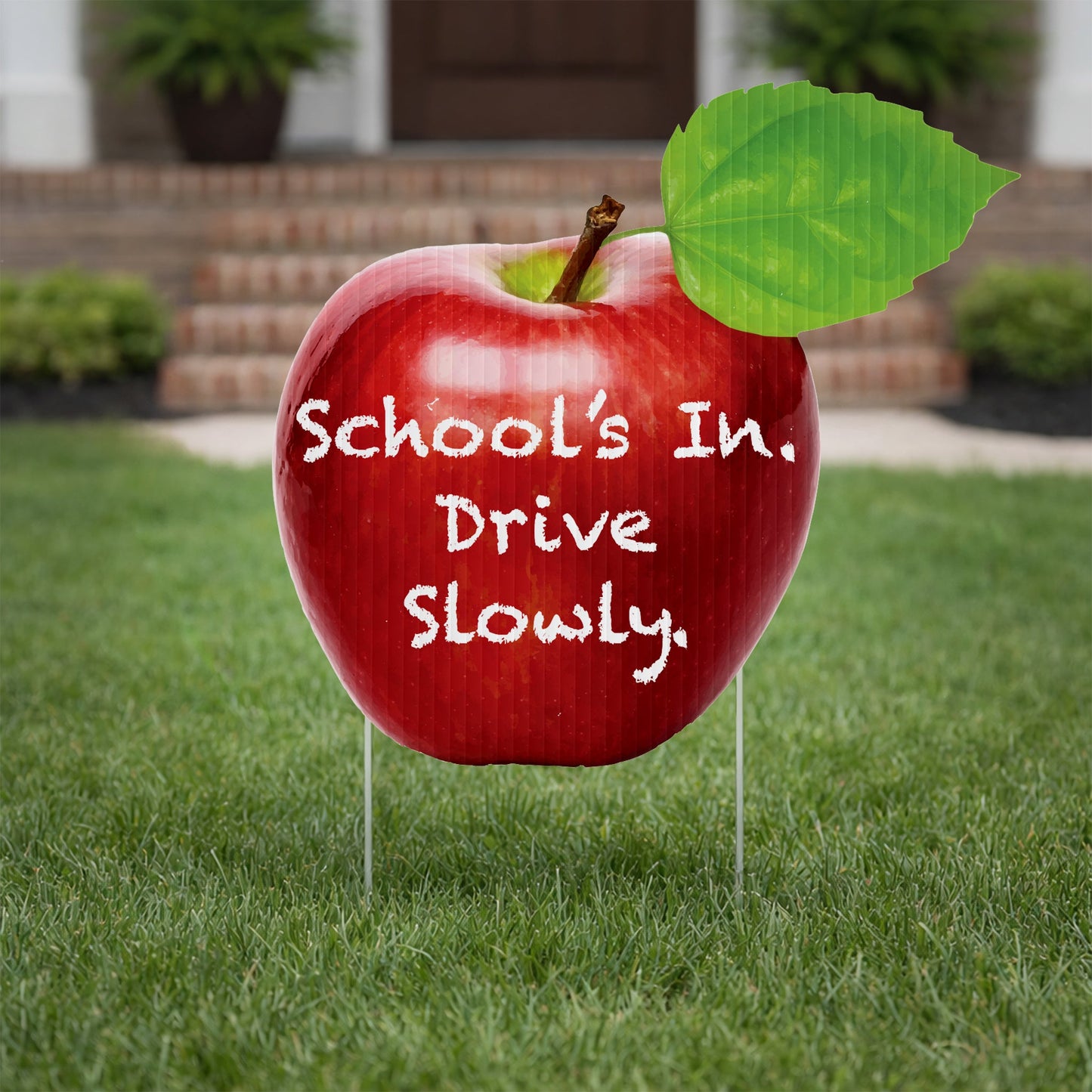 22" Apple Shaped Yard Sign - School's In Drive Slowly Sign
