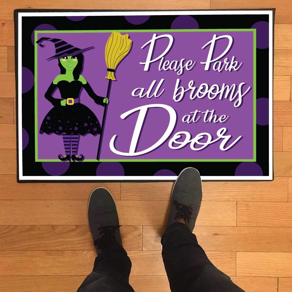 park all brooms at the door doormat
