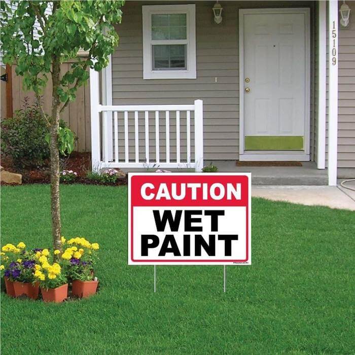 caution wet paint yard sign